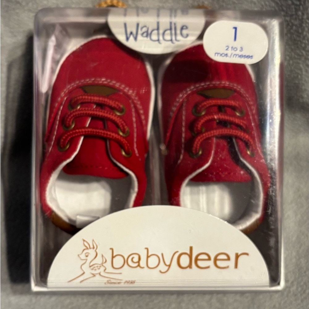 NWT Red waddle baby deer slip on shoes size 1
2 to 3 months